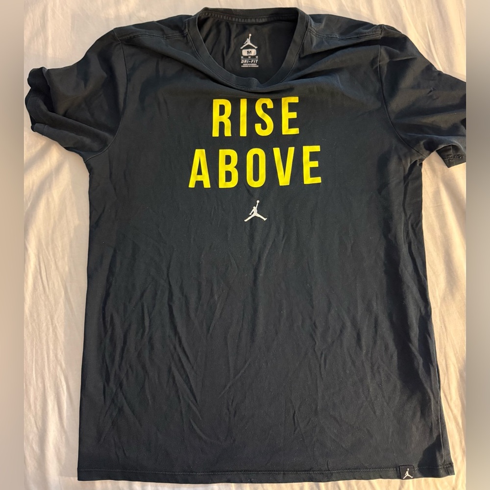 Jordan Black Short Sleeve Tee with Yellow "Rise Above" Graphic